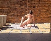 Inked MILF warming up her muscles by doing different kinds off stretches naked outside in the garden from naked yoga amateur from nudi sanilion