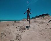 Russian girl Sasha Bikeyeva- Beautiful naked young girl with perfect figure dances on the Playa del Pouet in Valencia from perfect nude figure