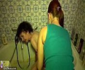 Granny and granddaughter bathe in the tub from help old woman