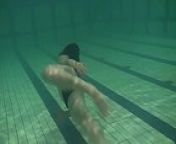 Brunette teen Kristina Andreeva swims naked in the pool from naked kristina