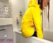 girl in yellow rubber raincoat playing with a rubber duck Teaser from macintosh rubber rainwear