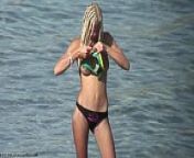 Topless blonde teen beach video from nudist beauty