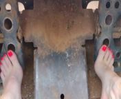Pedal pumping a bobcat tractor starting with shoes then socks then barefoot from tvactore