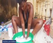 Laundry day: African babe AKIILISA thick thighs and sexy cleavage from village outd